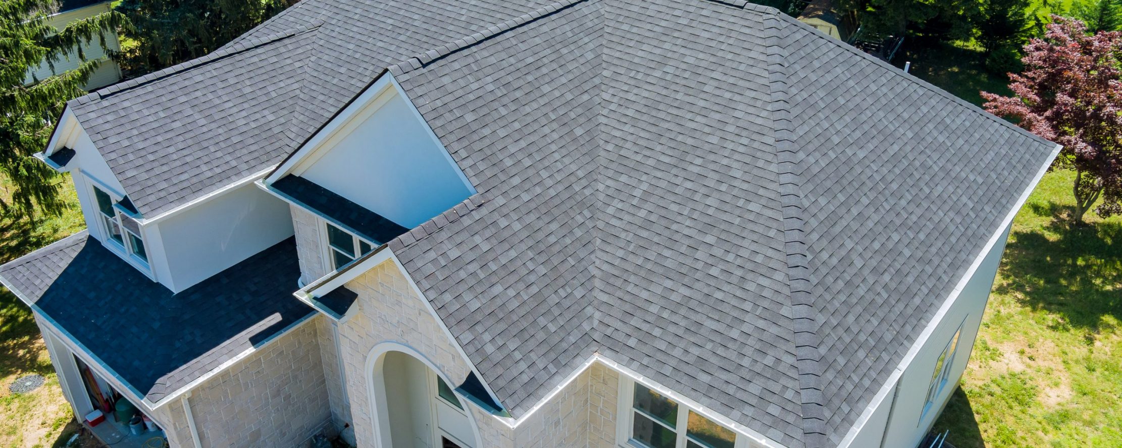 Aerial,View,Of,Asphalt,Shingles,Construction,Site,Roofing,The,House